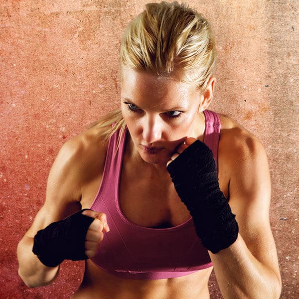 Mixed Martial Arts Lessons for Adults in Centreville VA - Lady Kickboxing Focused Background